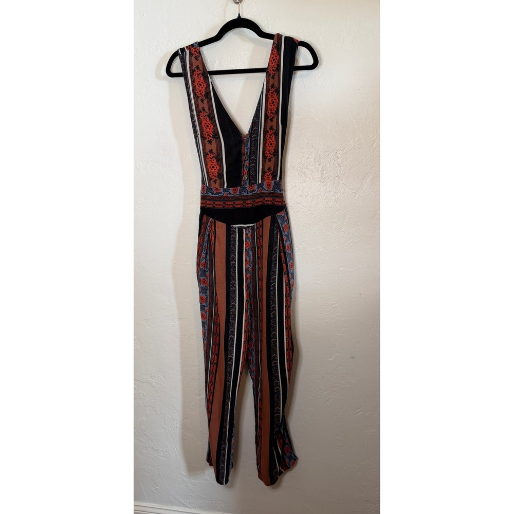 Free People All Shook Up Jumpsuit Rust Navy Floral Stripe Boho V-Neck Size 10